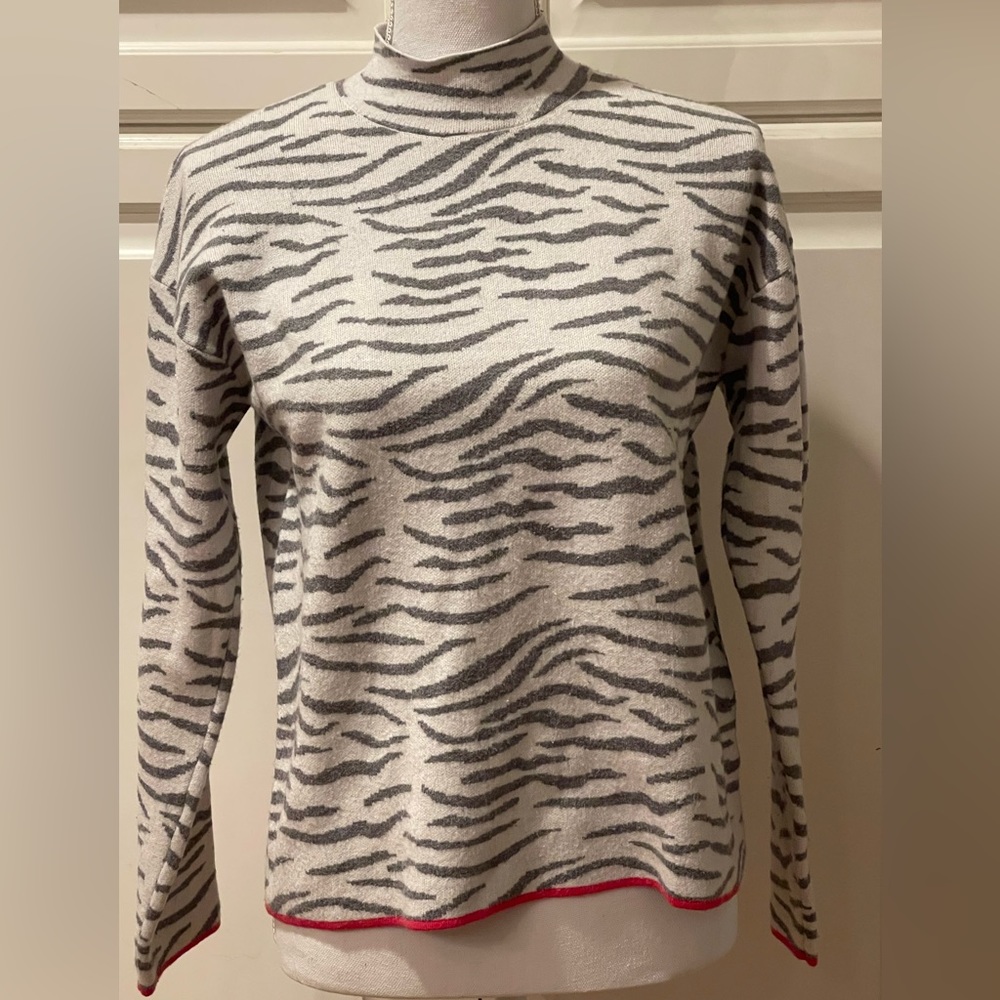 Anthropologie zebra stripe pullover with pink detail on the neck and cuffs
